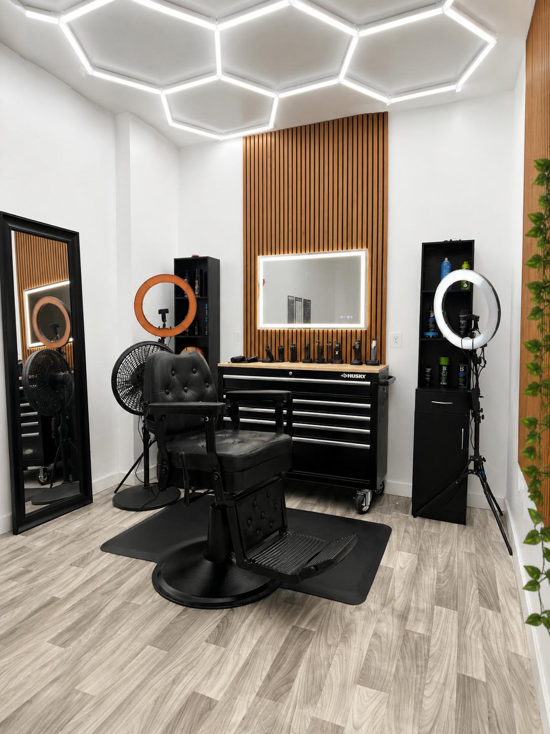 Barber chair and illuminated mirror