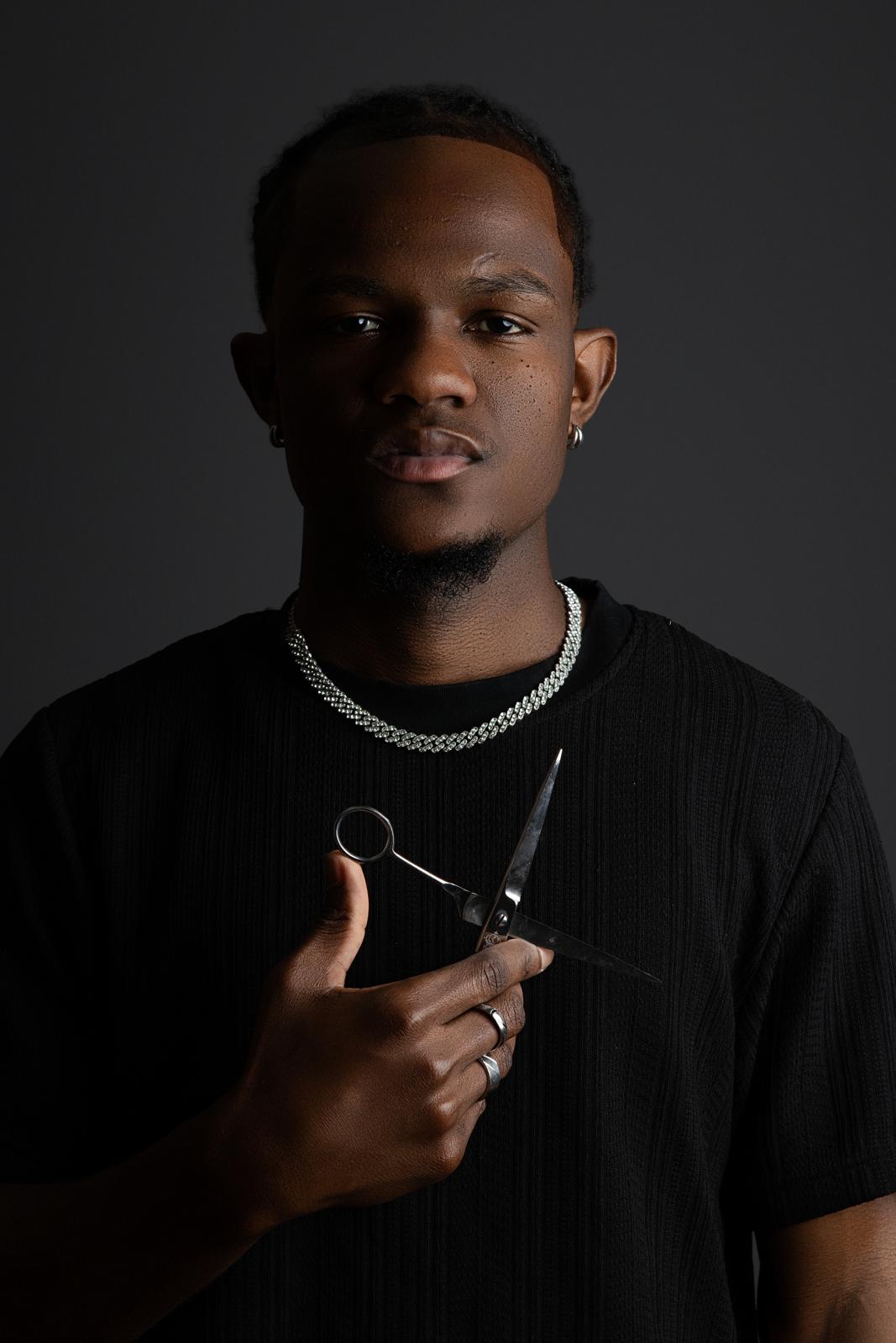 Mardoche Kirikou Lindor, owner and barber